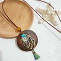Women's Ethnic Retro Tassel Round Leaves Hollow Out Necklace