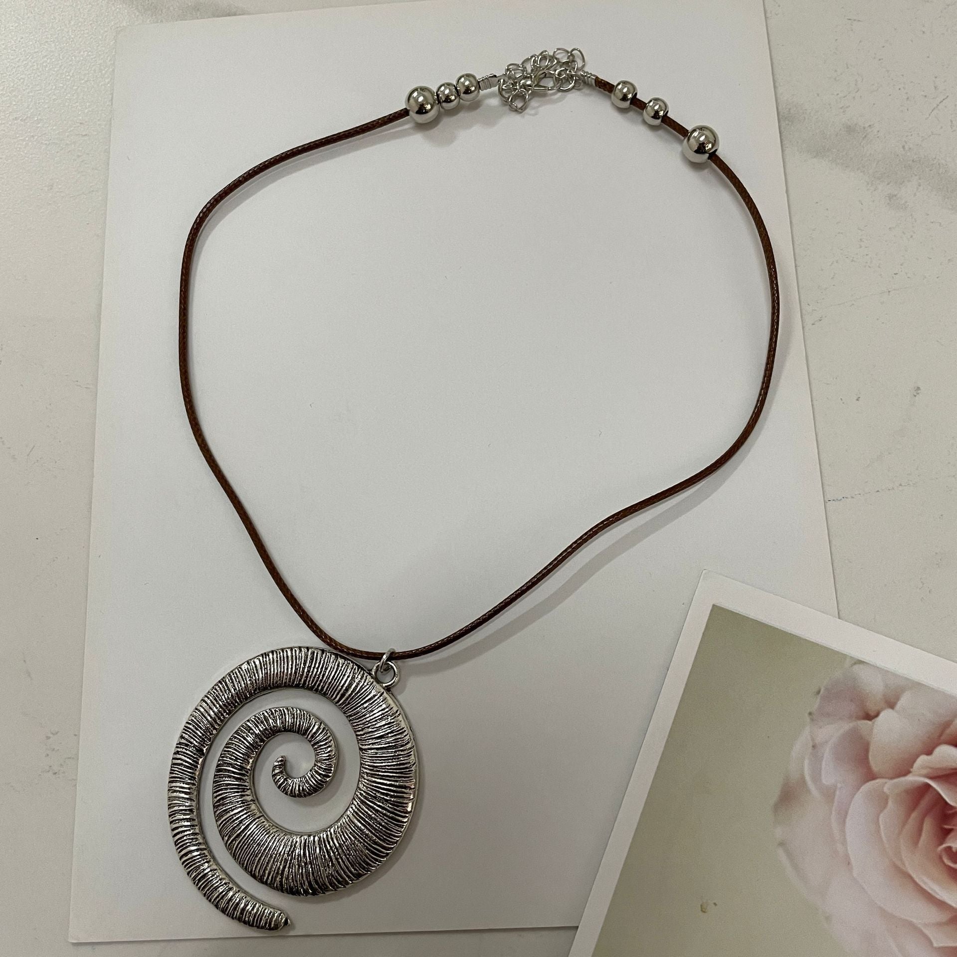 Women's Spiral Symbol Bohemian Retro Style Simple Ethnic Alloy Leather Necklaces